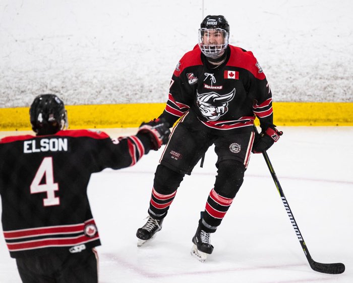 TORONTO, ON, Apr. 10, 2018: Andrew Cordssen-David of the Georgetown Raiders celebrates a goal scored with teammate Zac Elson during game seven of the OJHL Southwest Conference championship.