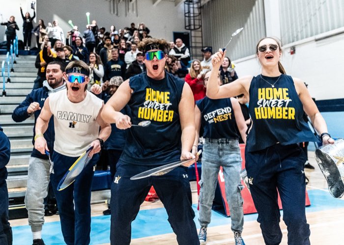 OAKVILLE, ON, Feb. 25, 2023: Humber Hawks fans celebrate during the Ontario Colleges Athletic Association Women’s Volleyball Championship game.