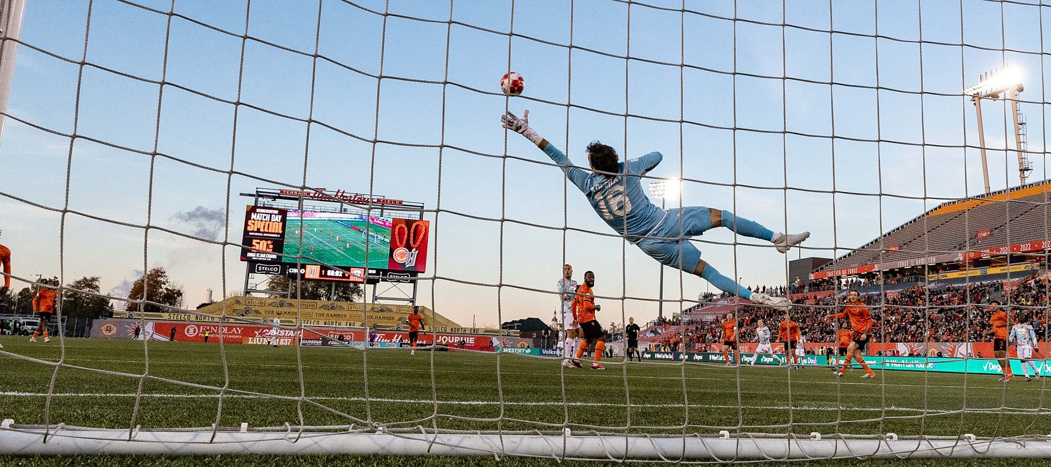 HAMILTON, ON, Oct. 6, 2019: Christopher Nanco of Forge FC jumps over Morey Doner of York9 FC in Canadian Premier League action.