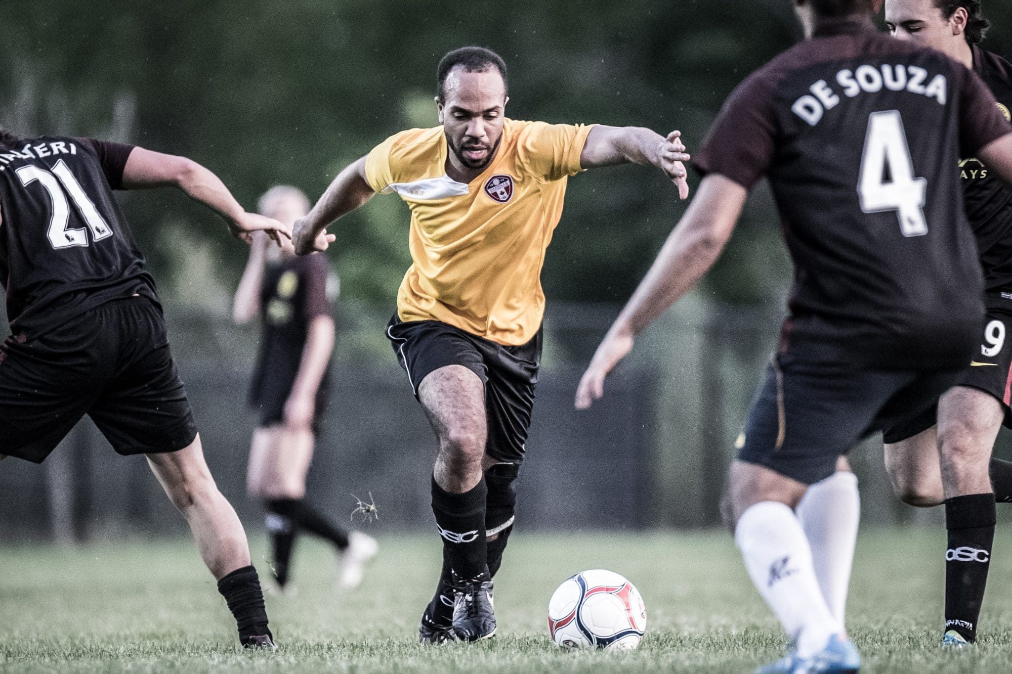 OAKVILLE, ON – MAY 29, 2017: Keanu Lloyd takes on the entire opposition by himself.