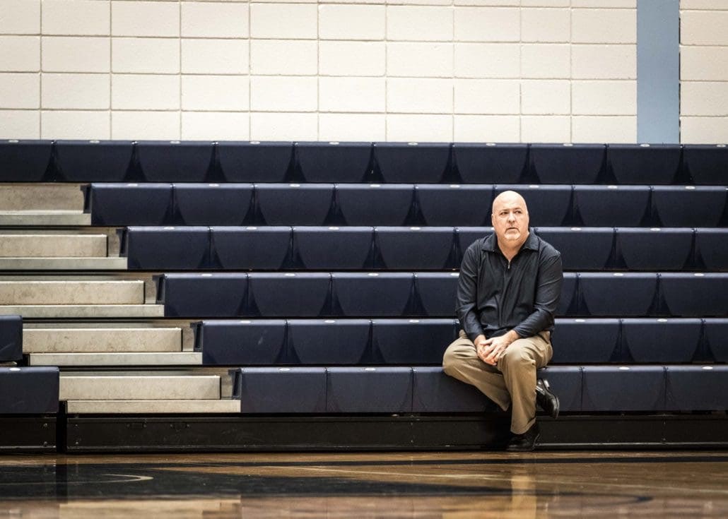BRAMPTON, ON – Nov. 27, 2016: Head coach Jim Flack of the Sheridan Bruins men’s basketball team watches a game from the stands, following his 300th career victory.