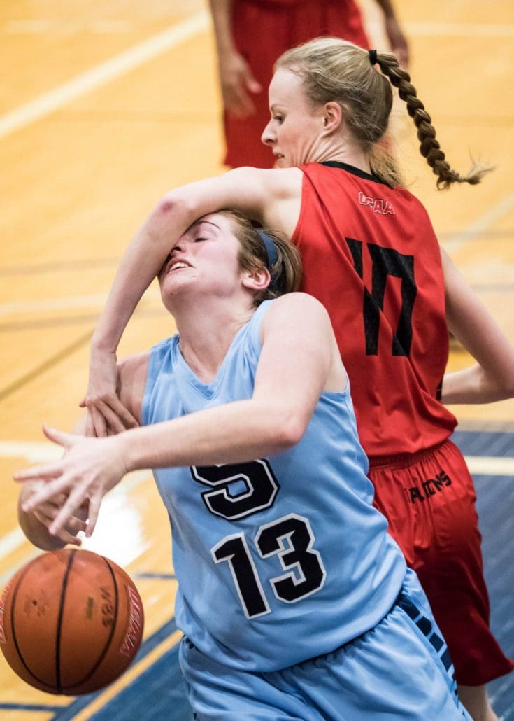 BRAMPTON, ON – Jan. 11, 2017: A Sheridan Bruins player is fouled against the Fanshawe Falcons.