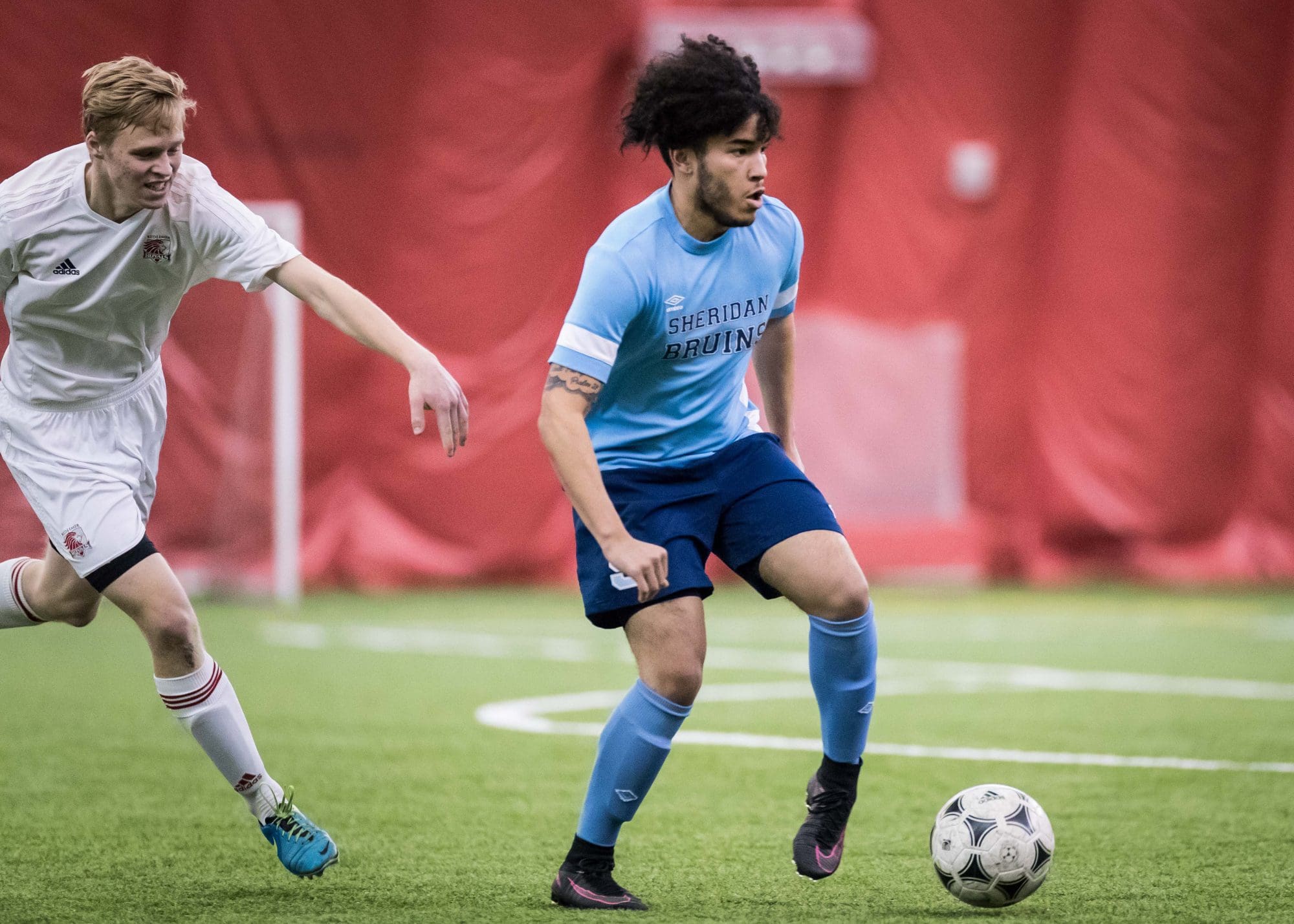 HAMILTON, ON – Mar. 10, 2017: Sheridan Bruins vs. Redeemer Royals indoor soccer game action.