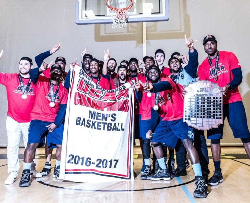 TORONTO, ON – Mar. 4, 2017: The Sheridan Bruins celebrate winning the 2017 OCAA Men's Basketball Championship.