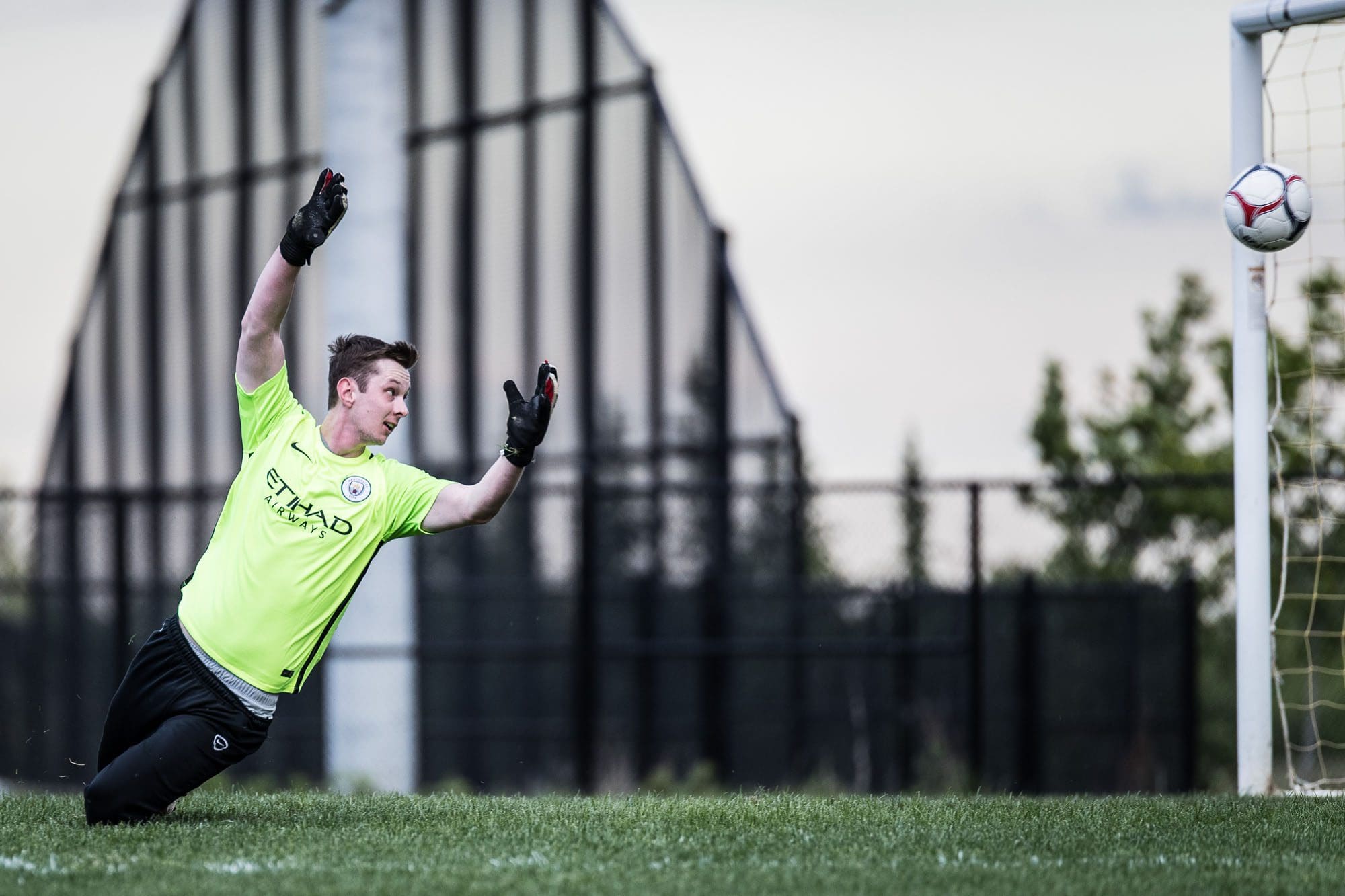 OAKVILLE, ON - May 22, 2017: A goalkeeper can only watch as a shot flies toward goal.