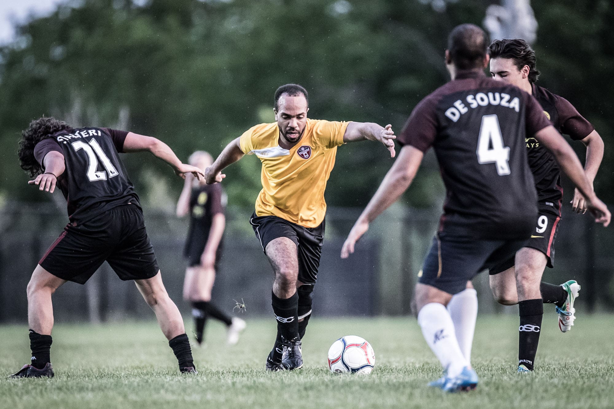 OAKVILLE, ON - May 29, 2017: A player takes on the entire opposition by himself.
