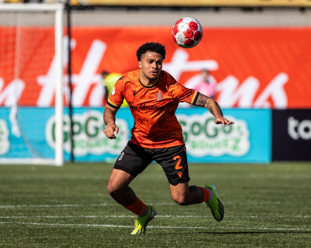 HAMILTON, ON - Apr 13, 2024: Canadian Premier League soccer game between Forge FC and Cavalry FC, Malcolm Duncan (#2) Defender for Forge FC controls the ball during the first half. (Photo by Kevin Raposo / kevinraposo.com)
