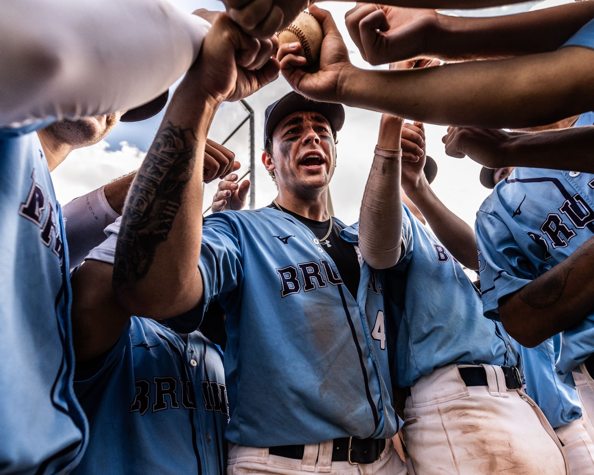 MISSISSAUGA, ON – SEP. 21, 2024: Tyler Barbier of the Sheridan Bruins leads a huddle before an Ontario Colleges Athletic Association baseball game against the St. Clair Saints. MISSISSAUGA, ON – SEP. 21, 2024: Tyler Barbier of the Sheridan Bruins leads a huddle before an Ontario Colleges Athletic Association baseball game against the St. Clair Saints.